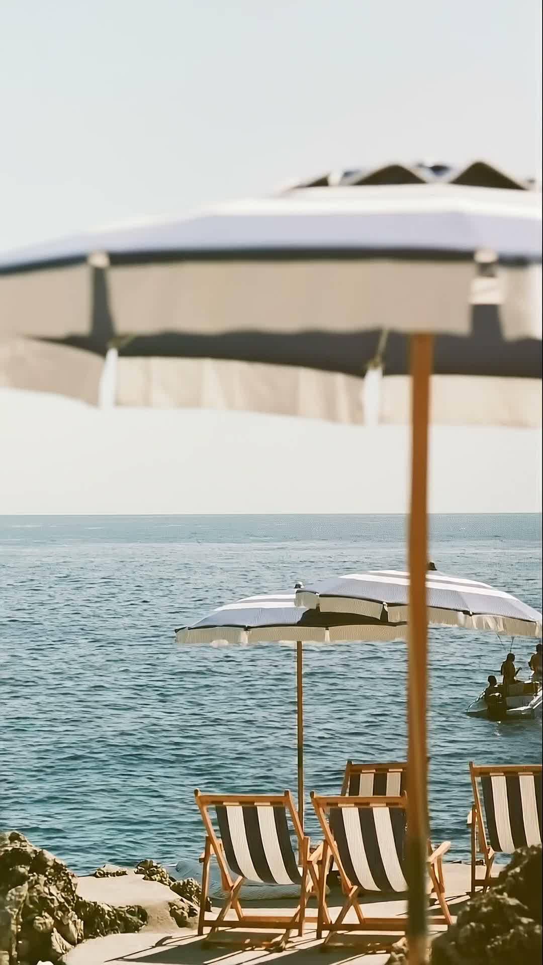 Italian Beach Club with Striped Parasols