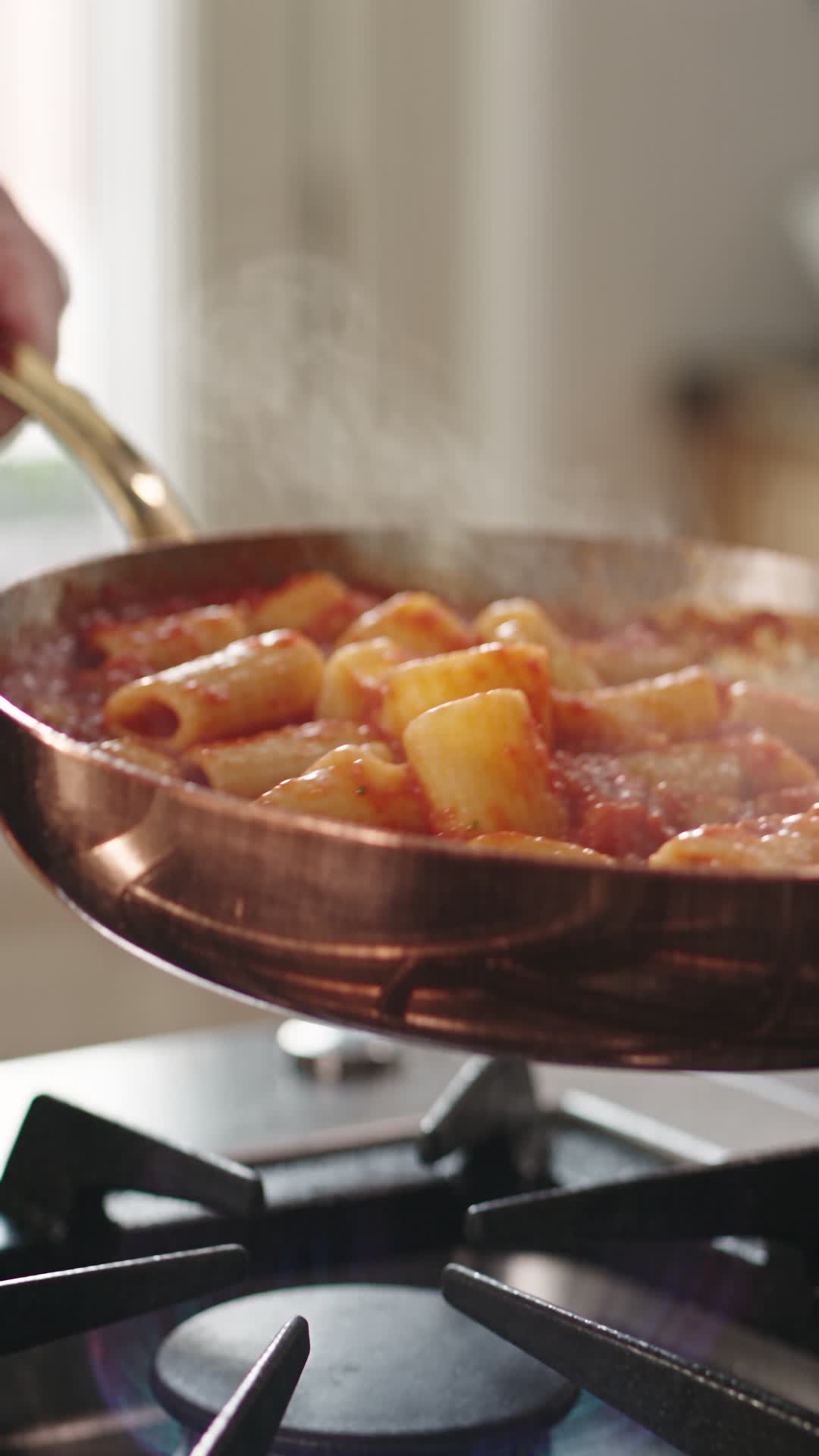 Tossing Rigatoni in Copper Pan