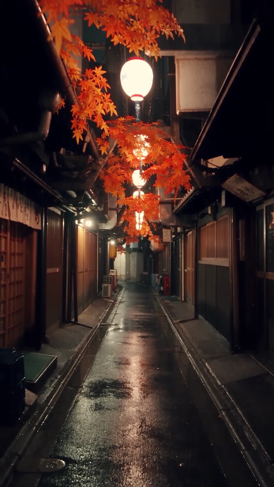 Narrow Tokyo Alley with Lanterns and Maple Leaves