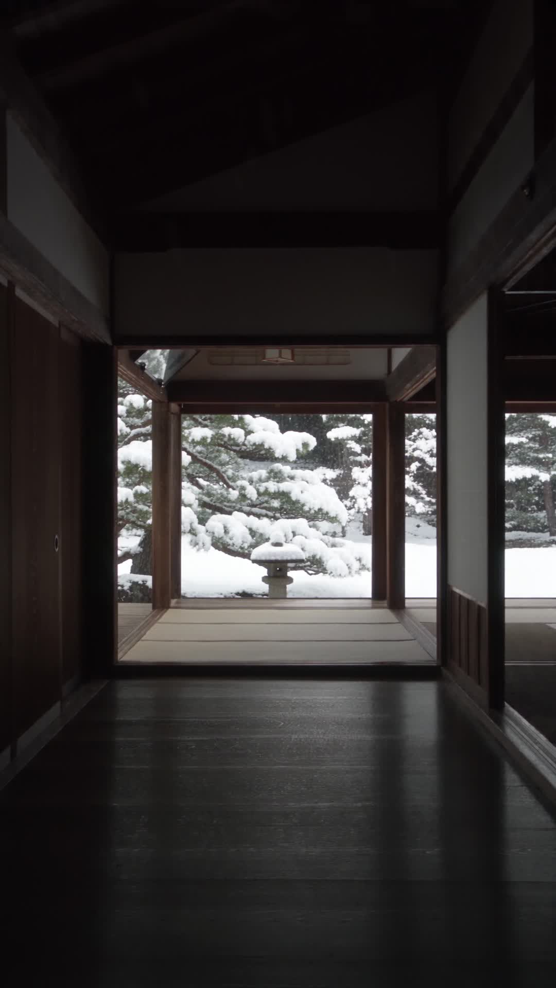 Snowy Garden View from Dark Wooden Temple Hall