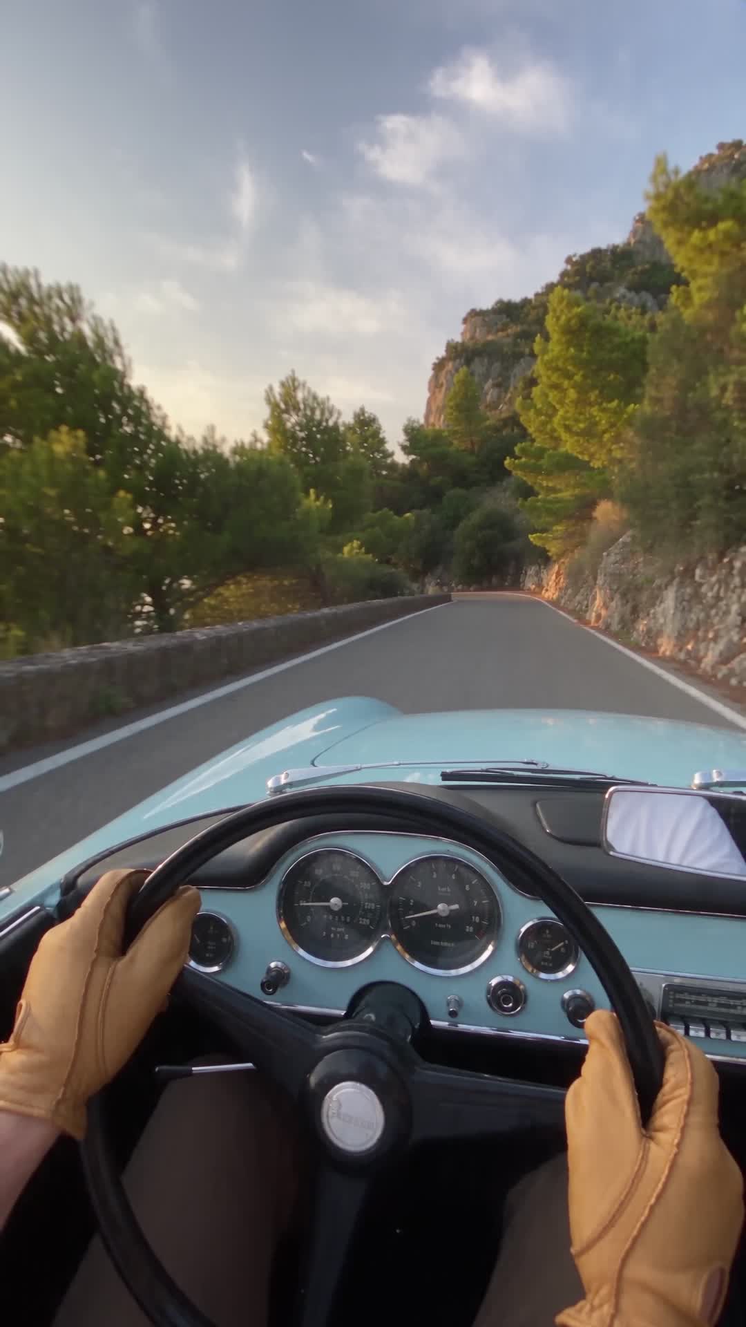 Driver's View in Vintage Convertible on Coastal Road